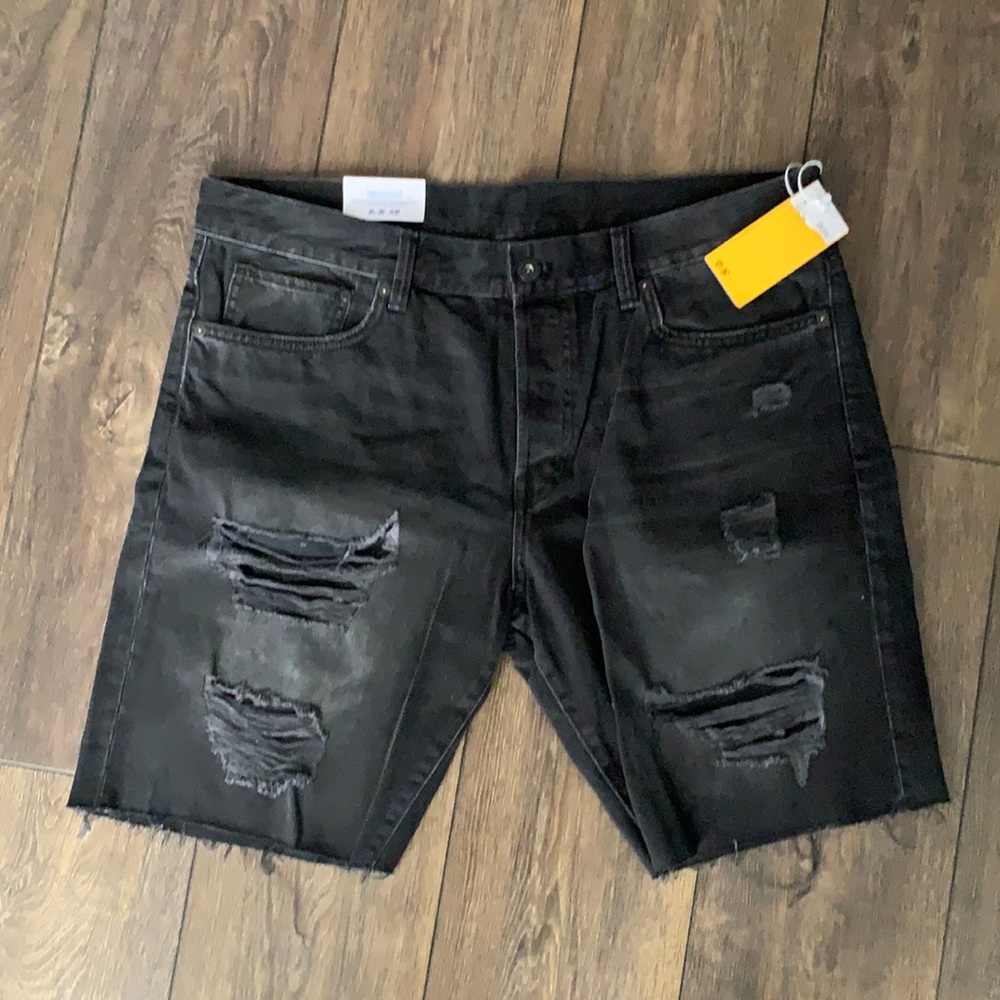 Black semi ripped shorts